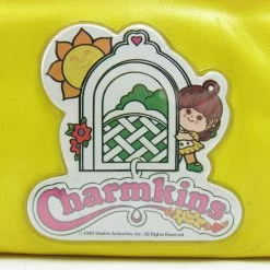 Hasbro Charmkins Vintage Yellow Vinyl Kisslock Coin Purse With Brown Eyed Susan -Hasbro Shop Charmkins brown eyed susan yellow vinyl kisslock coin purse